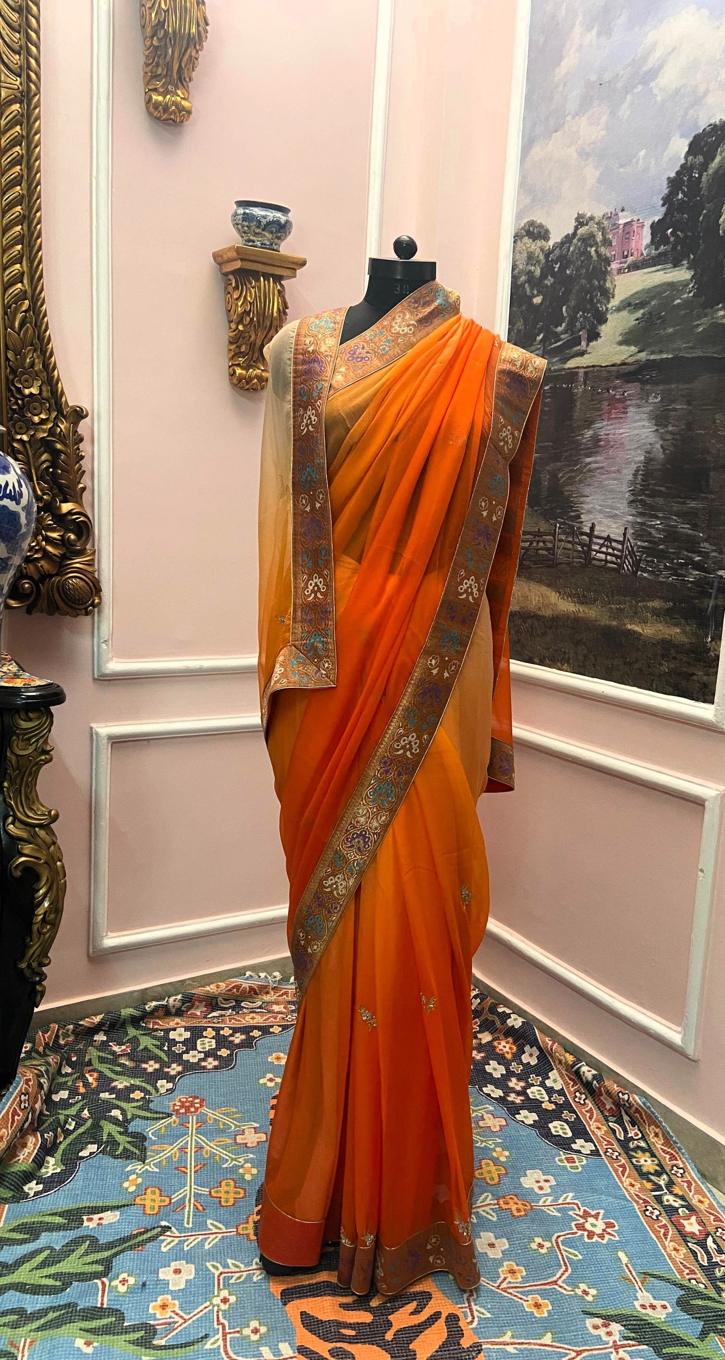 Orange shaded antique border saree