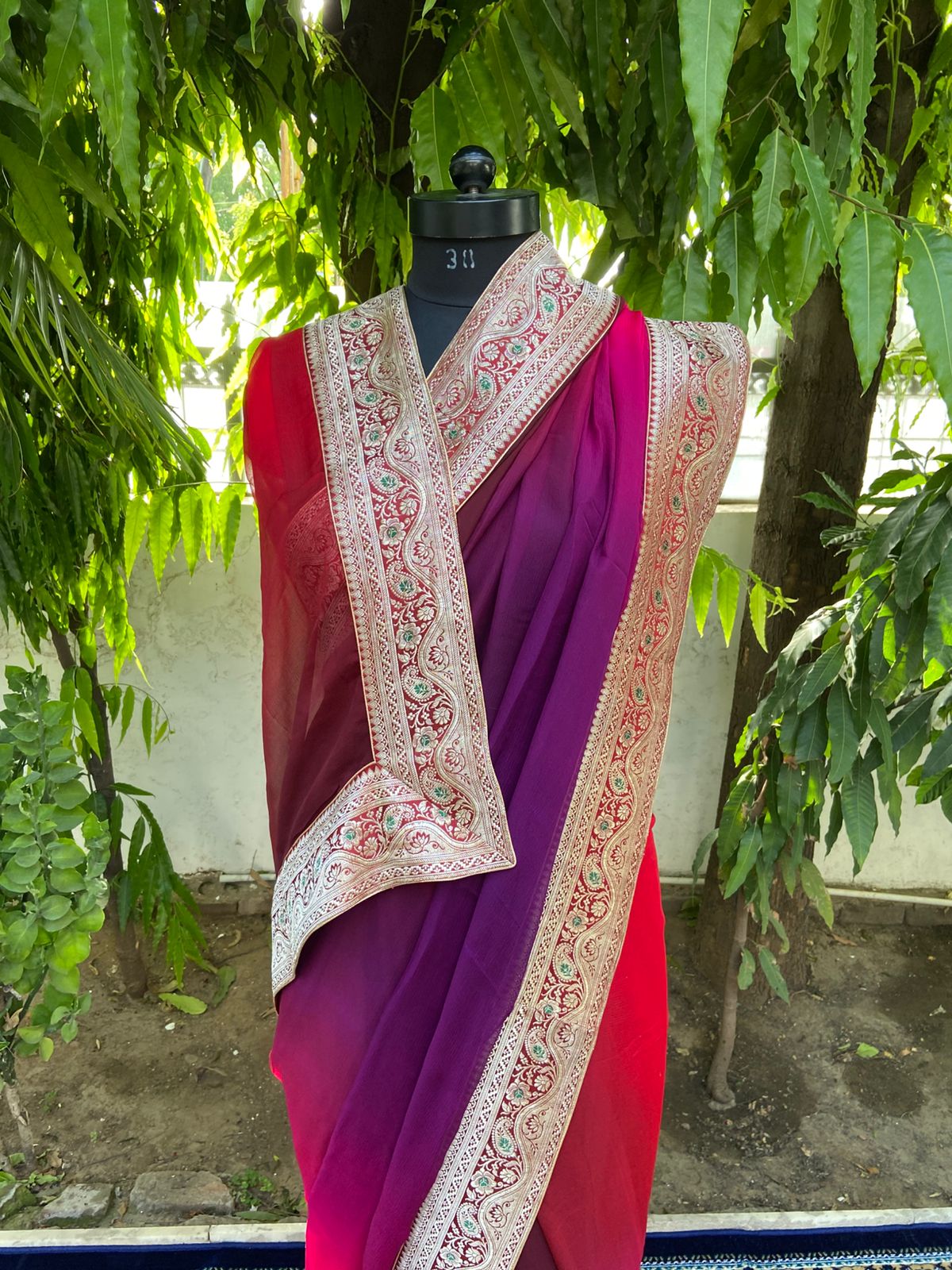 Red-rani shaded antique border saree