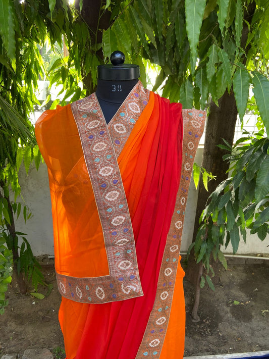 Orange to red antique border saree