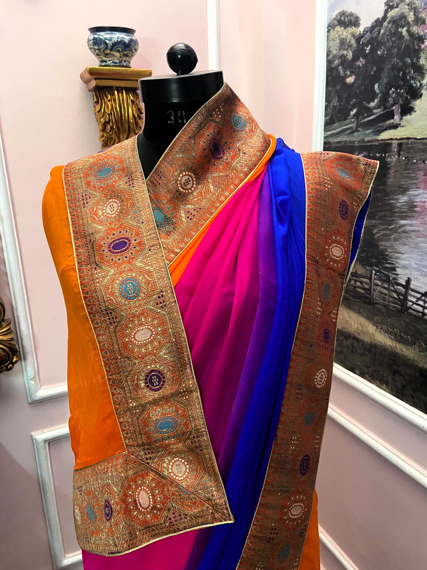 Orange blue multicolor antique border saree