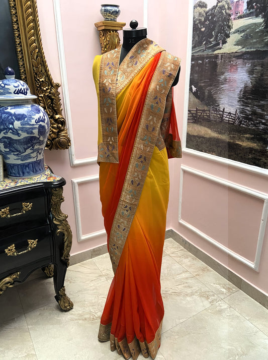 Yellow orange shaded antique border saree