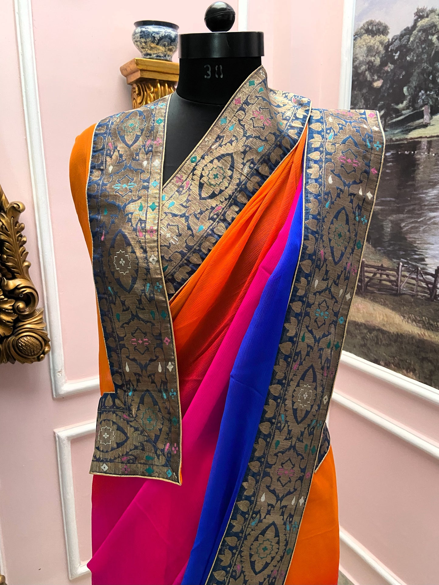 Orange rani shaded antique border saree