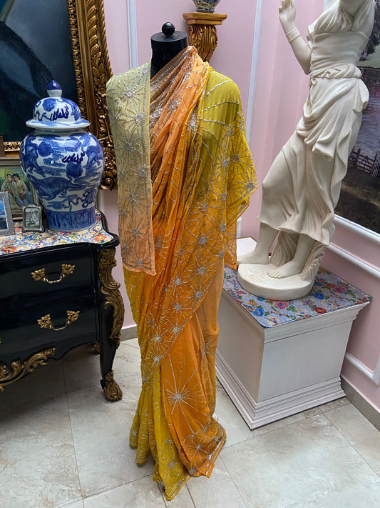 Yellow & Orange four tone shaded chiffon with starburst jaal
