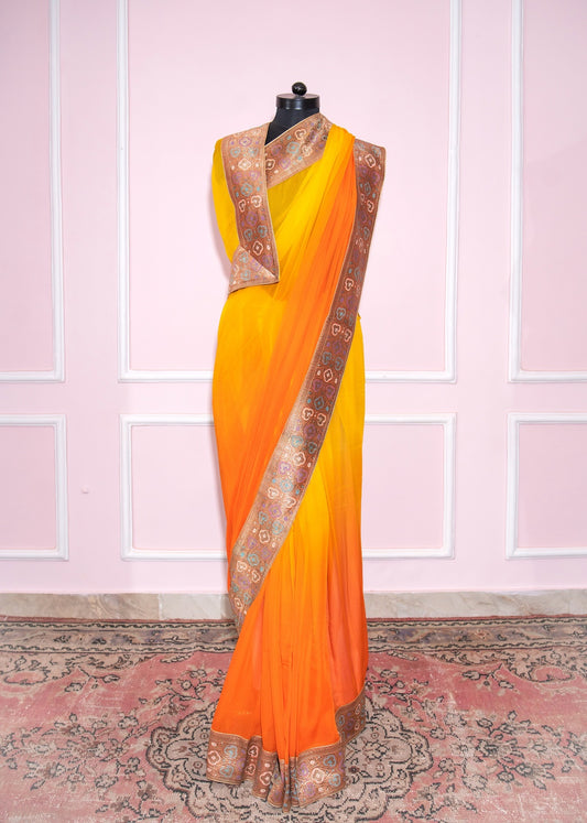Yellow to orange ombre antique border saree