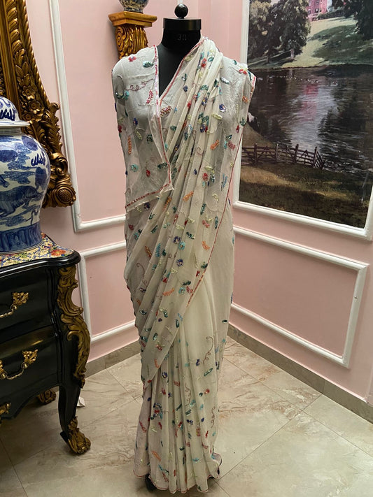 Off white saree with intricate sequin jaal all-over