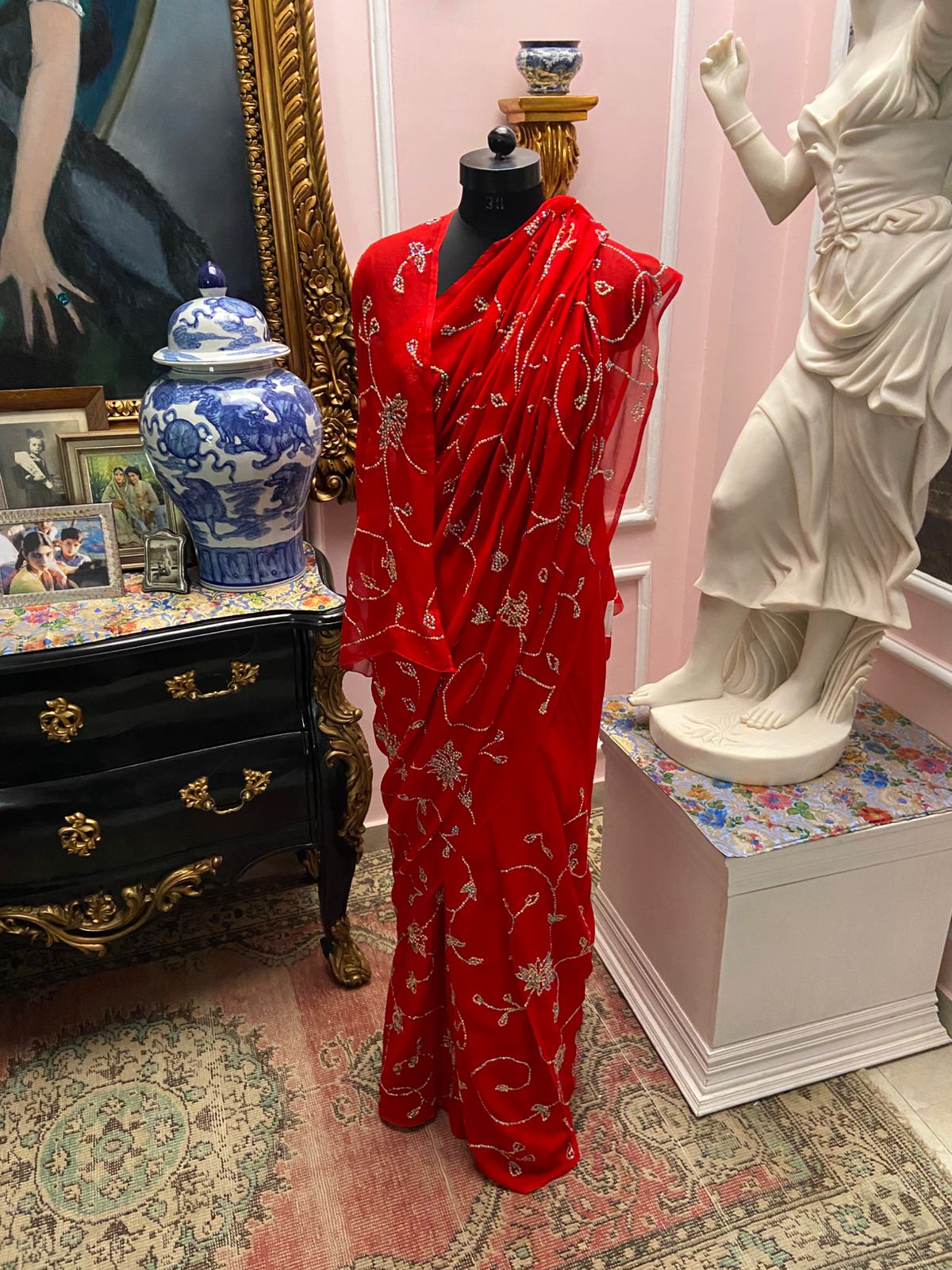 Single tone Red chiffon saree with multicolor sequin jaal