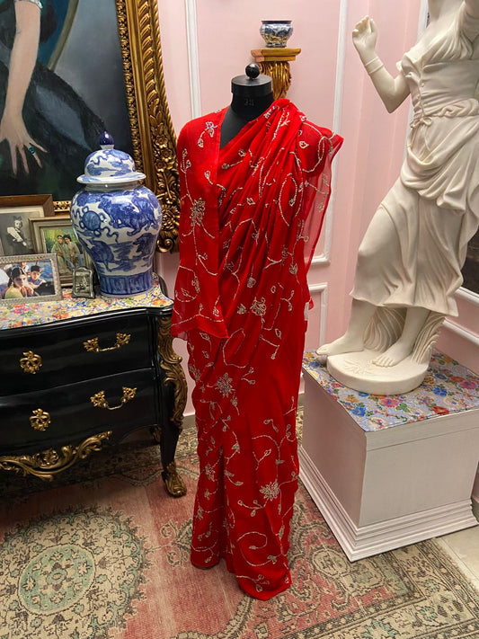 Single tone Red chiffon saree with multicolor sequin jaal