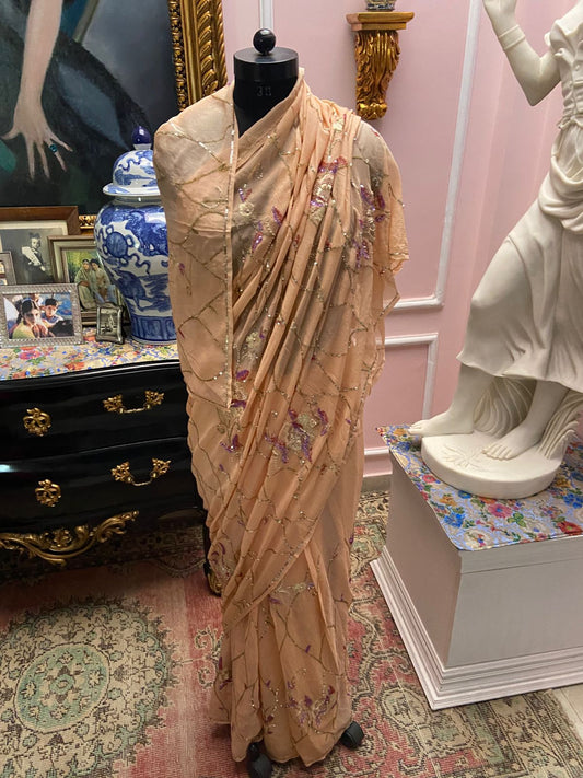 Peach single tone chiffon saree with multicolor sequin flower motif & jaal