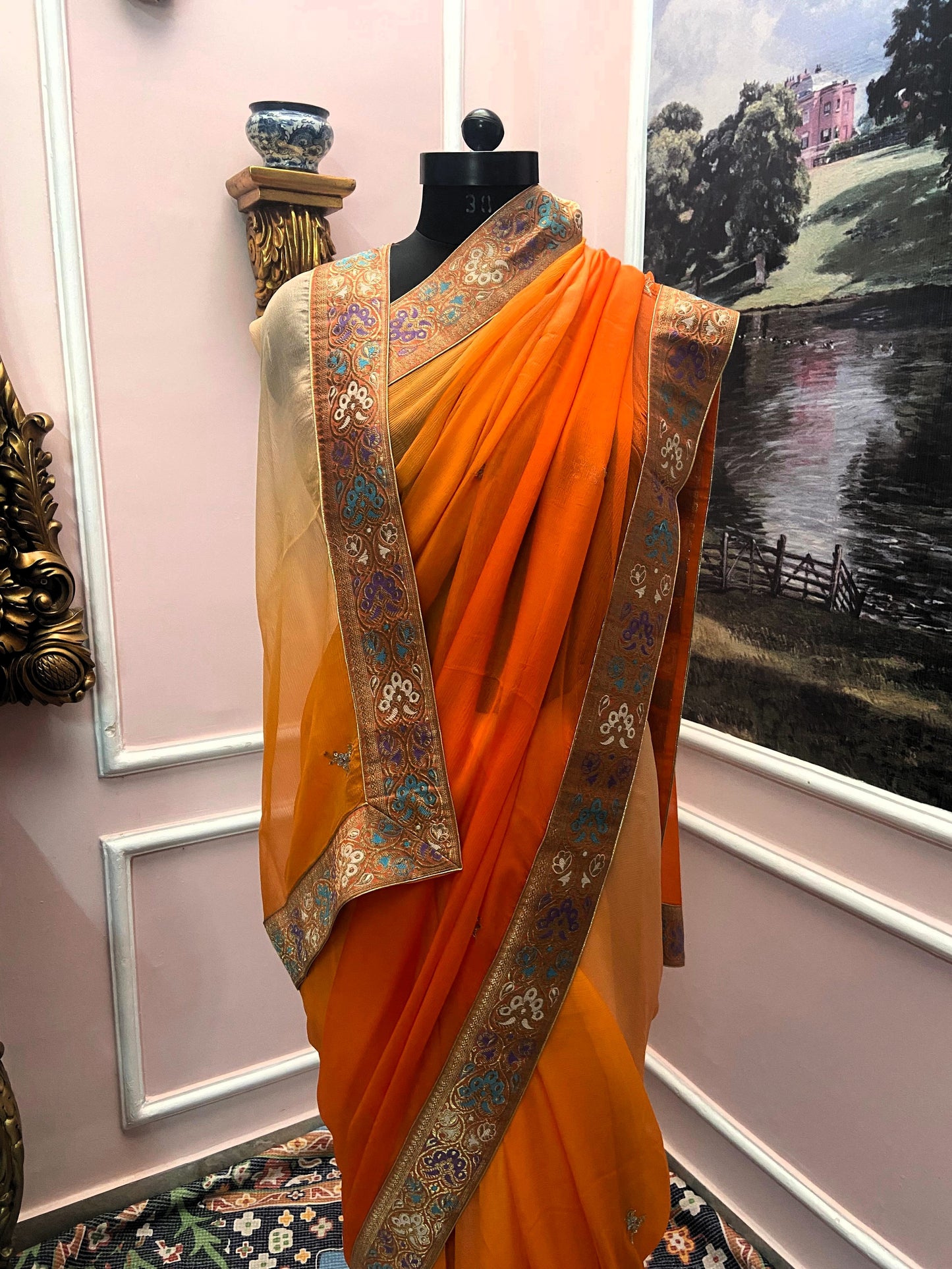 Orange shaded antique border saree