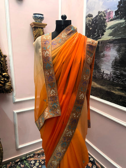 Orange shaded antique border saree