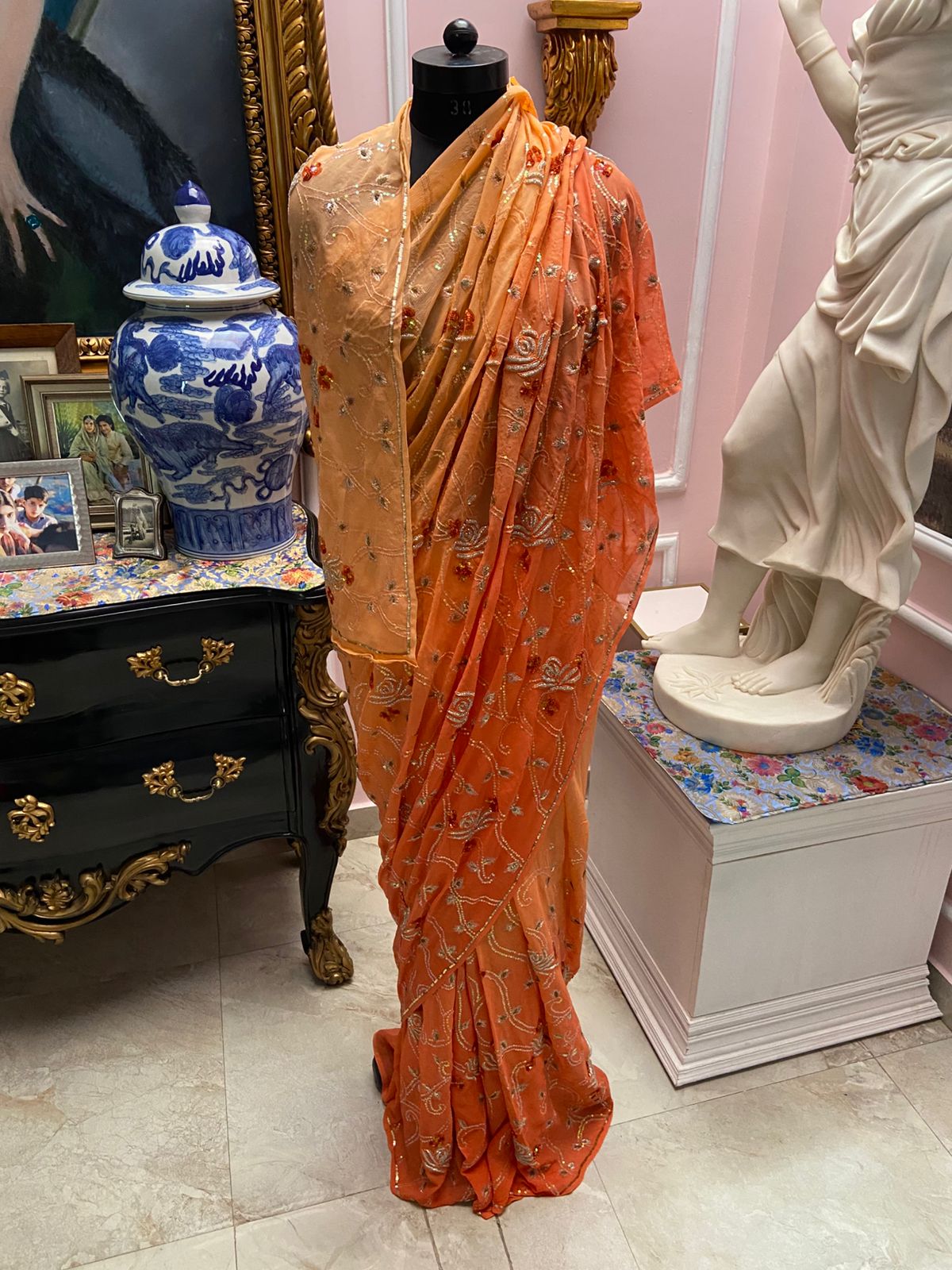 Peach to orange ombre shaded chiffon saree with all-over jaal