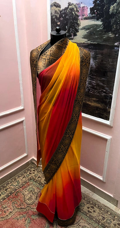Yellow Rani Shaded Antique Border Saree