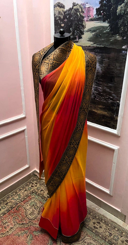 Yellow Rani Shaded Antique Border Saree