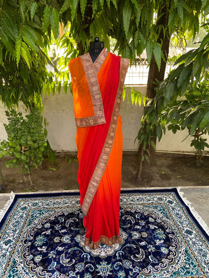 Orange to red antique border saree
