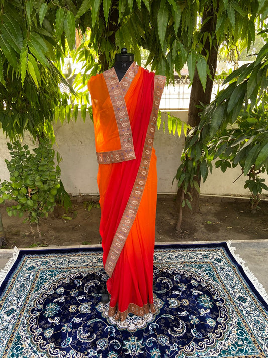 Orange to red antique border saree