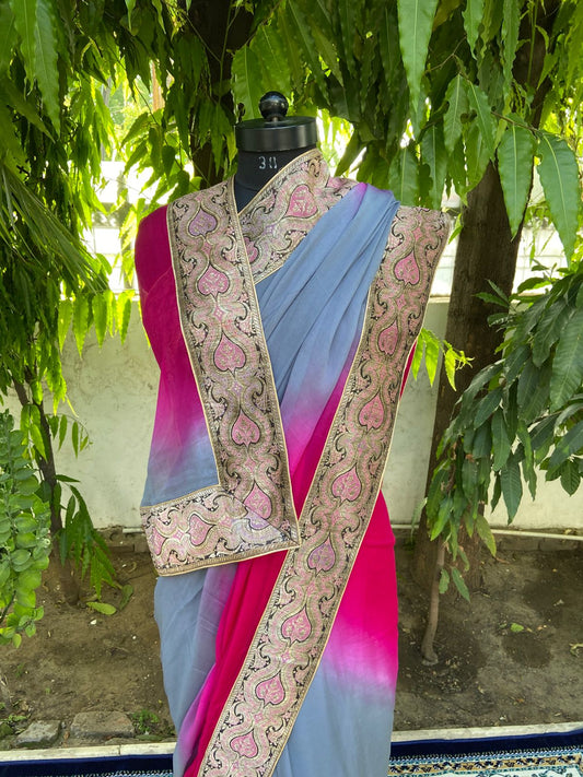 Rani to grey shaded antique border saree