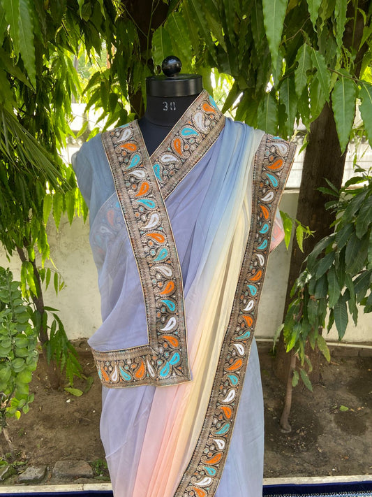 Grey to peach shaded antique border saree