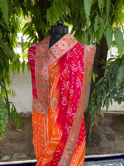 Red orange bandhej printed antique border saree