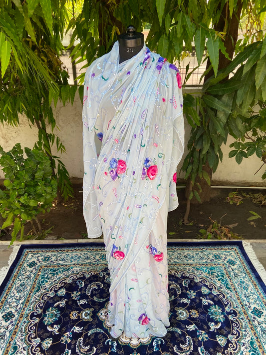 Powder blue georgette saree