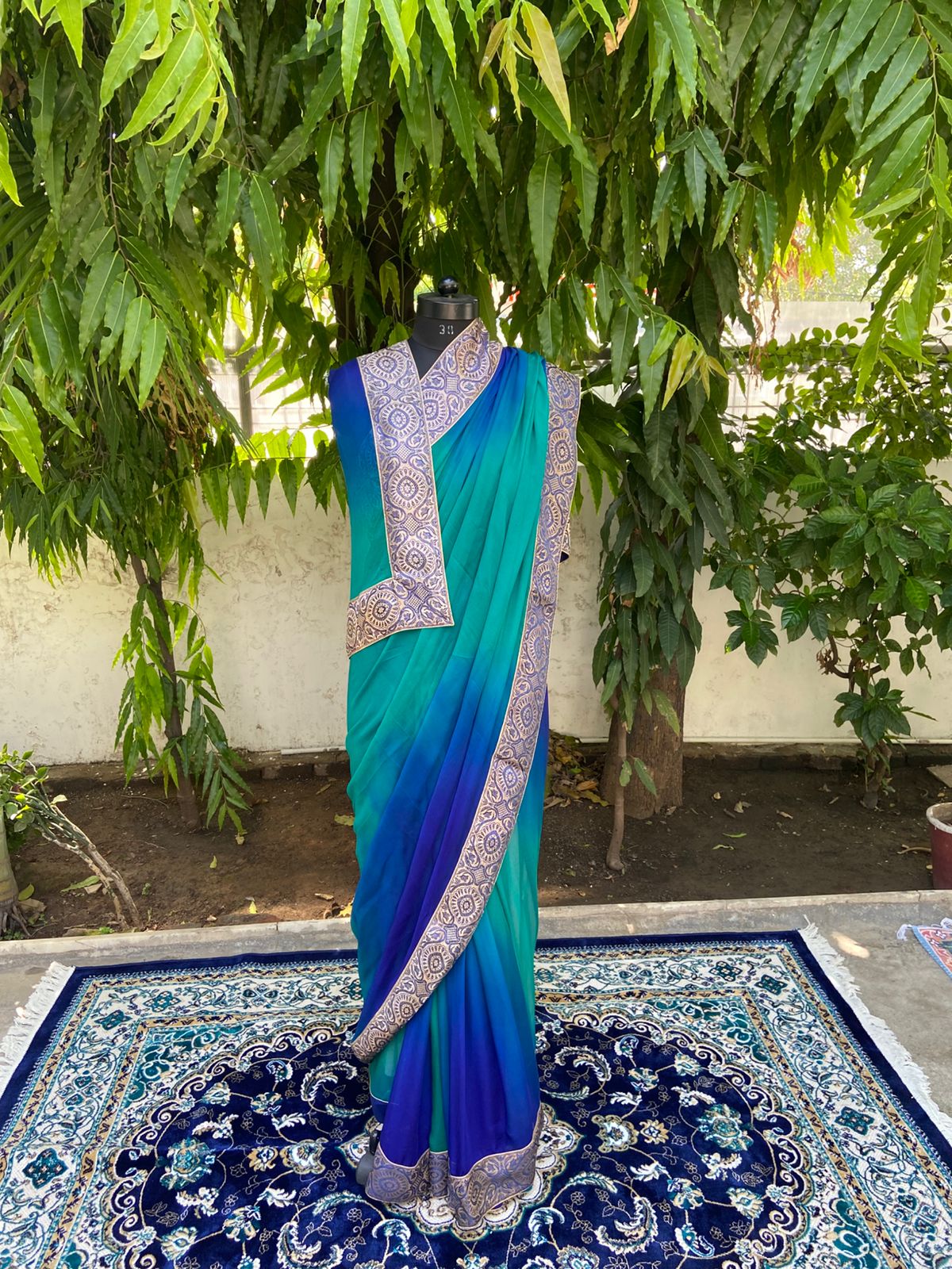 Blue to sea green shaded antique border saree