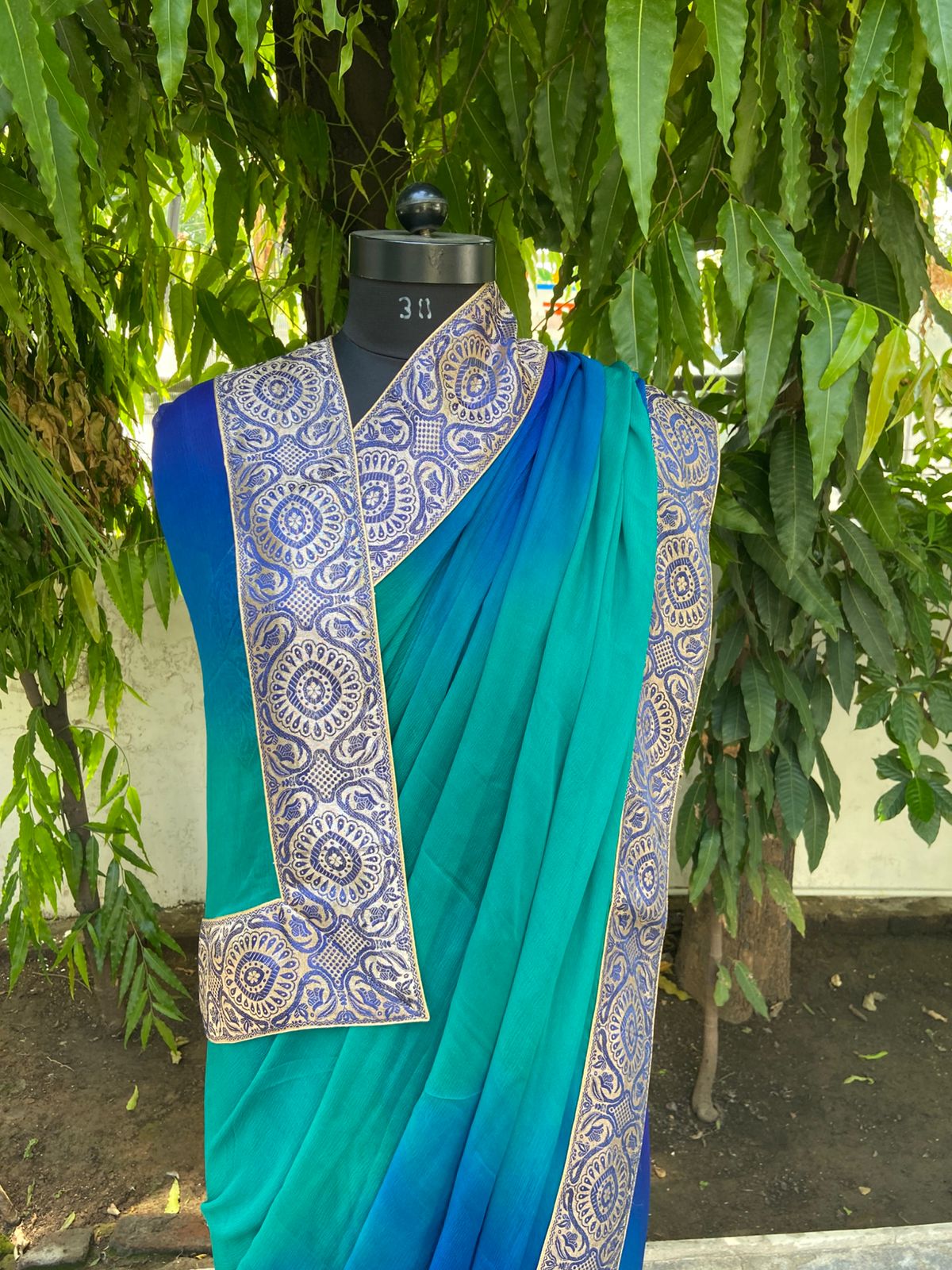 Blue to sea green shaded antique border saree