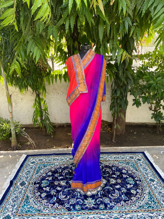 Orange rani to blue shaded antique border saree
