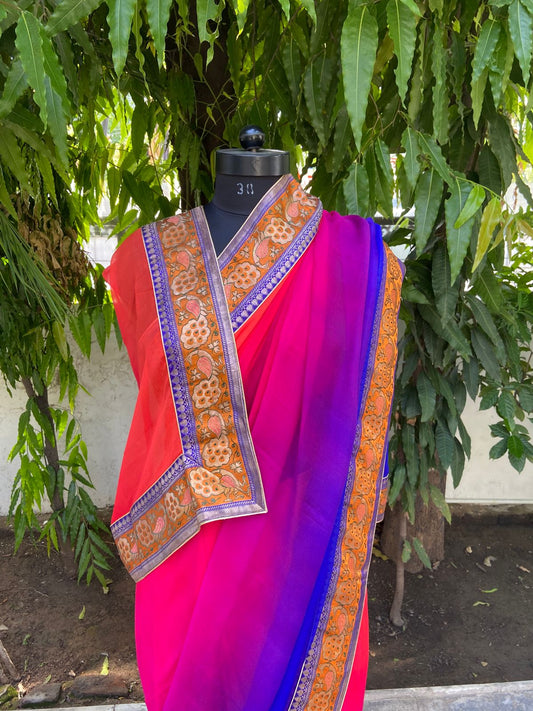 Orange rani to blue shaded antique border saree