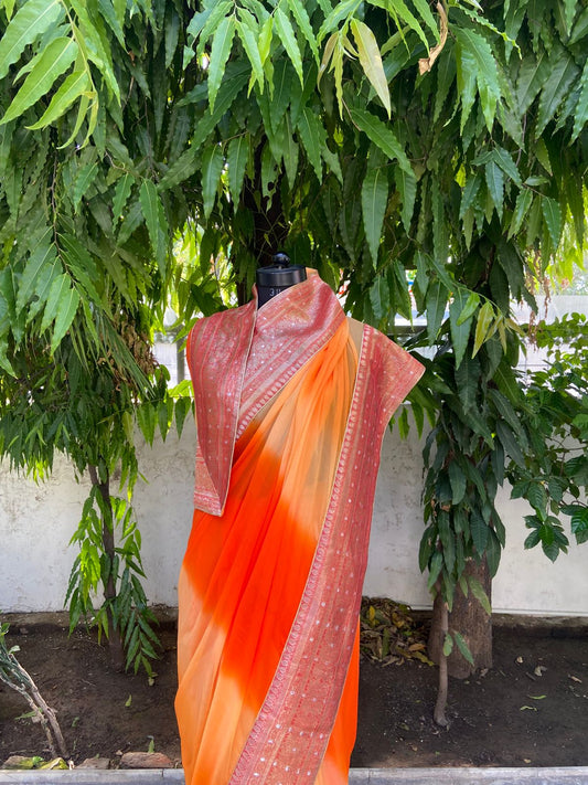 Yellow orange shaded antique border saree