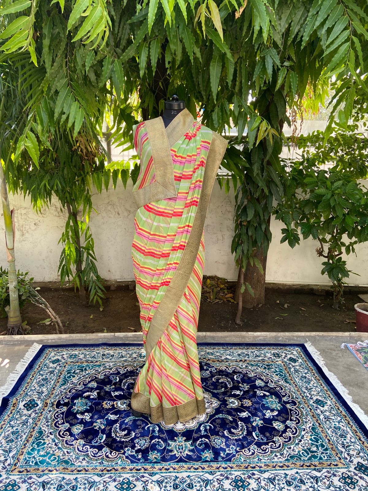 Light green multicolor antique border saree