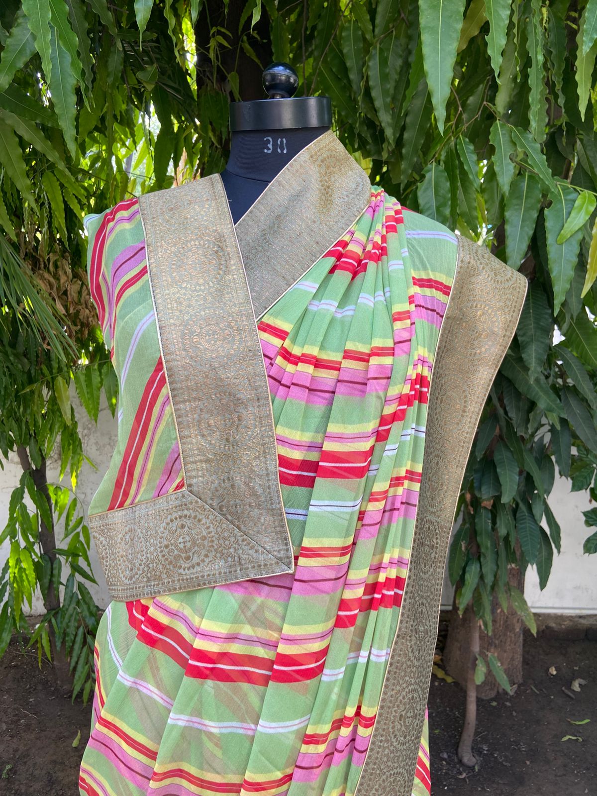 Light green multicolor antique border saree