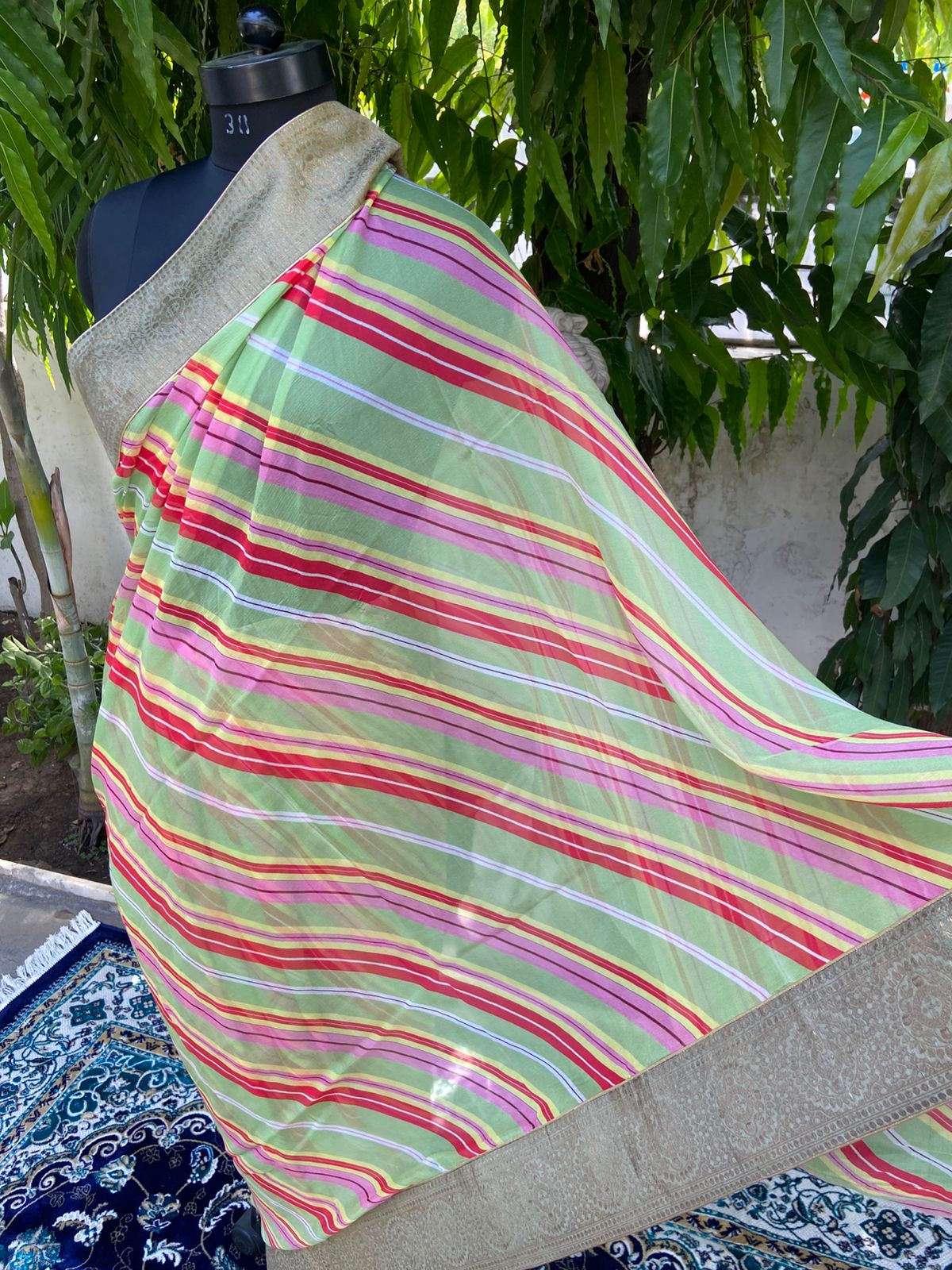 Light green multicolor antique border saree
