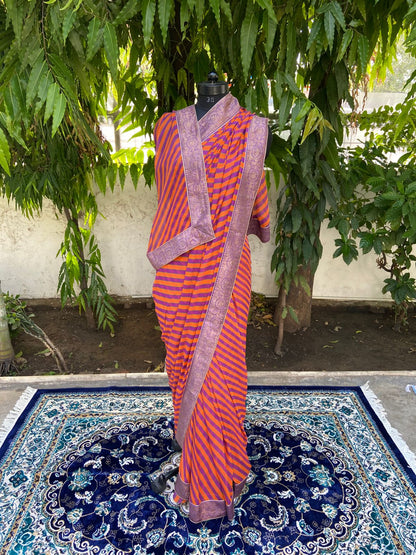 Orange rani multicolor lehariya antique border saree