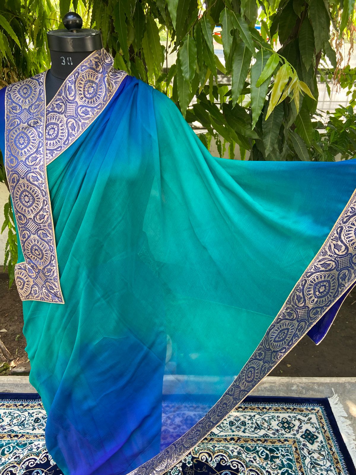 Blue to sea green shaded antique border saree