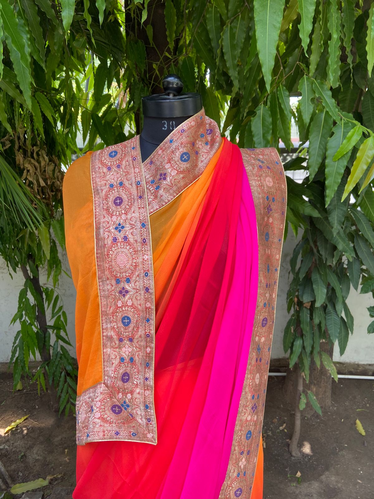 Orange to red-rani shaded antique border saree